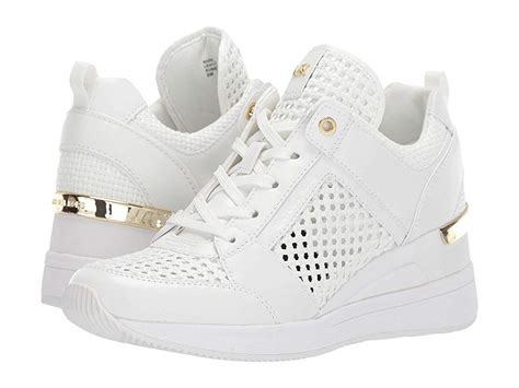 michael kors women's spencer wedge trainer sneaker|michael kors gold wedges.